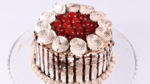 Chocolate Cherry Drip Cake Recipe | Dawat