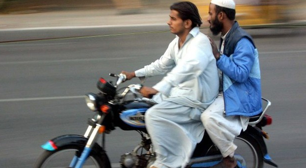 Pillion riding (double sawari)