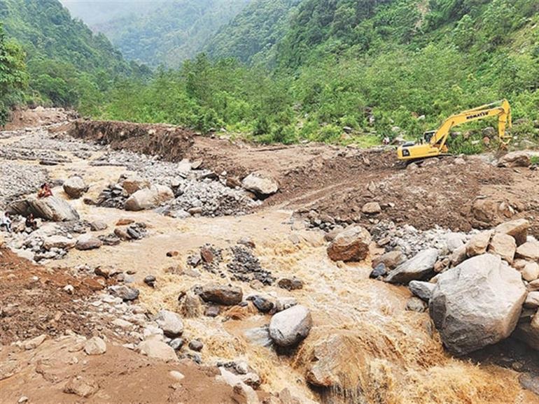 At least ten people lost their lives in the Himalayan regions of India and Nepal as a result of severe flooding, landslides, and heavy rainfall on Friday.