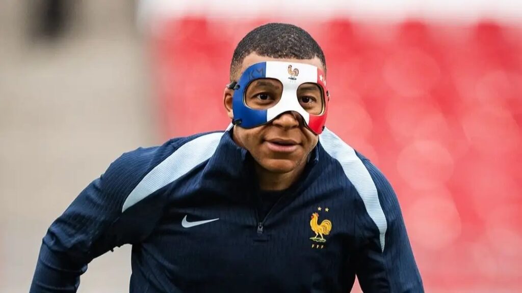 Famous French footballer Kylian Mbappe turned a few heads enough by wearing a customised mask to practice, enough to even end up trending online.