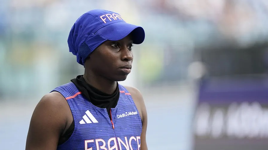 French government and Olympics officials are seeking a creative solution to allow Muslim French sprinter Sounkamba Sylla to wear her hijab at the opening ceremony while still complying with the country's secularism laws, they said on Wednesday.