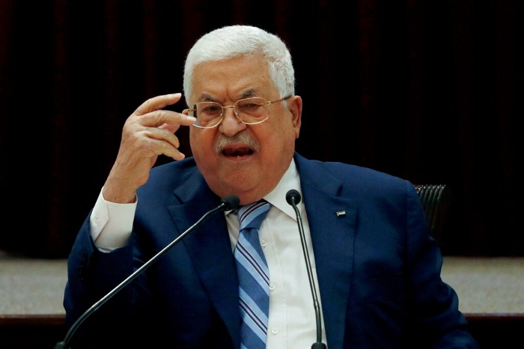 Palestinian President Mahmoud Abbas said Israel and the United States were responsible for an attack that killed dozens in the Gaza Strip on Saturday, but the Western-backed leader also blamed Hamas for the continuing war in Gaza.