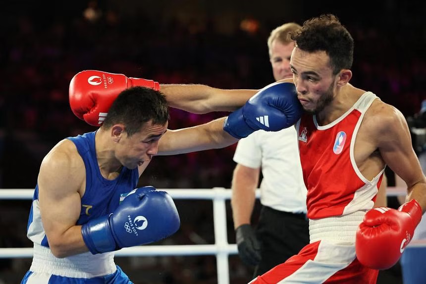 Rio Olympics champion Hasanboy Dusmatov claimed the men's flyweight boxing final after beating Billal Bennama at the Paris Olympics