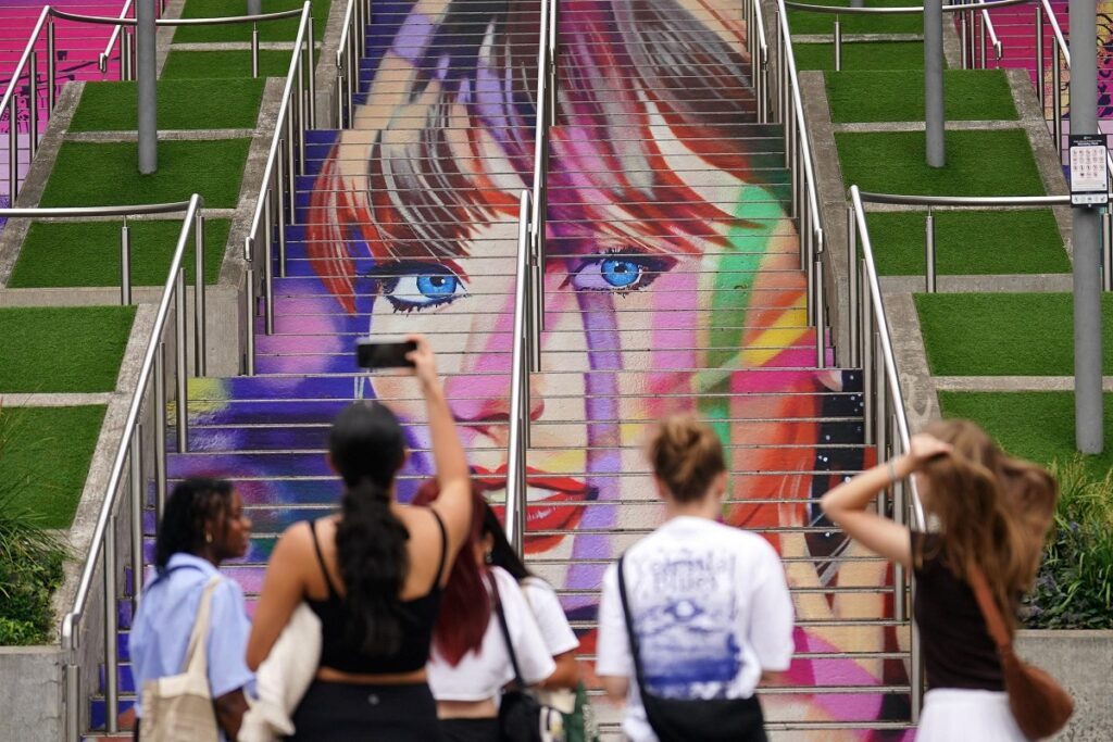 Fans arriving at Taylor Swift's concert in London on Thursday said solidarity among fellow Swifties was helping to dispel any security concerns they had after her Vienna concerts were cancelled last week.