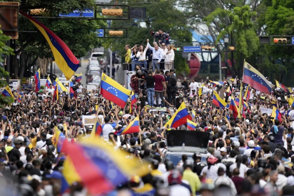 Thousands of Venezuelans marched across the South American country on Saturday over its contested election, as President Nicolas Maduro told supporters some 2,000 people had been arrested during protests against the results.