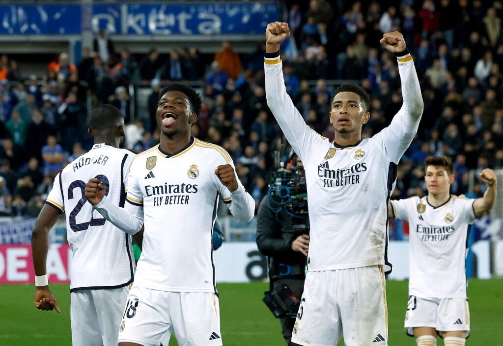 Real Madrid survived a late scare as goals by Lucas Vazquez, Kylian Mbappe and Rodrygo gave them a 3-2 home win over Deportivo Alaves in LaLiga on Tuesday.