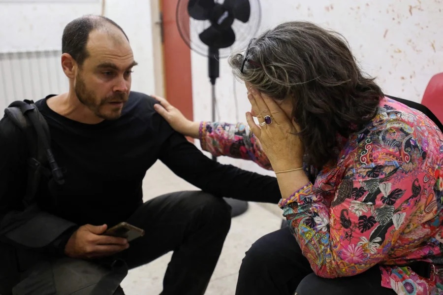 Israeli troops shot and killed a Turkish-American woman who had been taking part in a protest against settlement expansion in the Israeli-occupied West Bank on Friday, Palestinian and Turkish officials said.