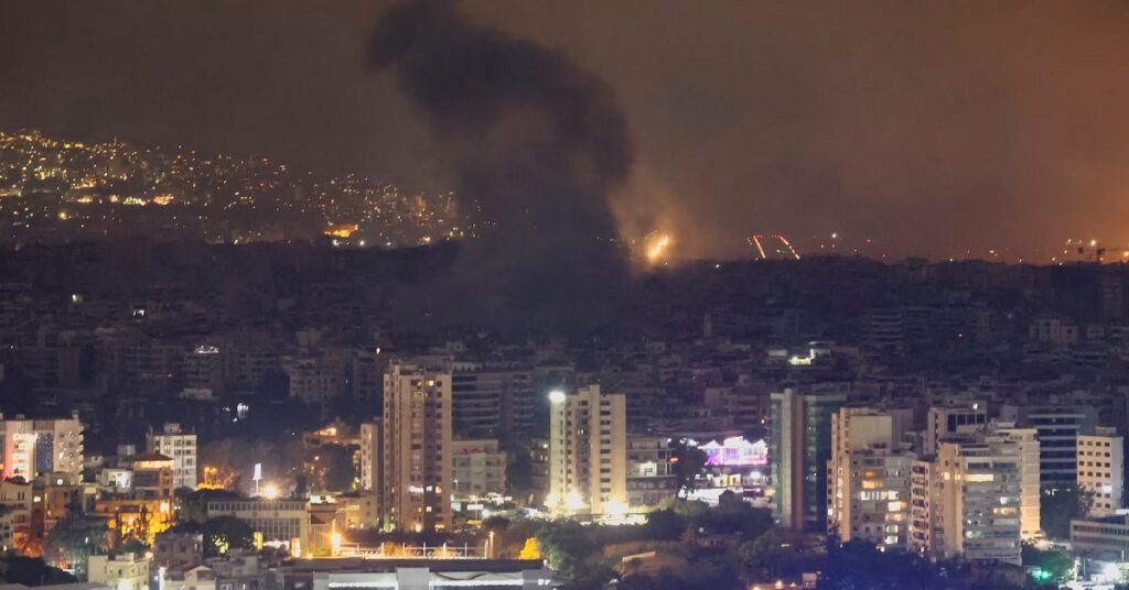 Hezbollah fired rockets at Israel's third-largest city, Haifa, and Israel looked poised to expand its offensive into Lebanon on Monday, one year after the devastating Hamas attack on Israel that sparked the Gaza war.