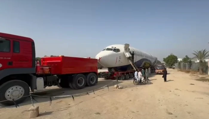 PIA plane transported by road