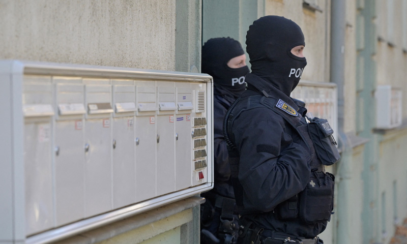 Poland indicts two men