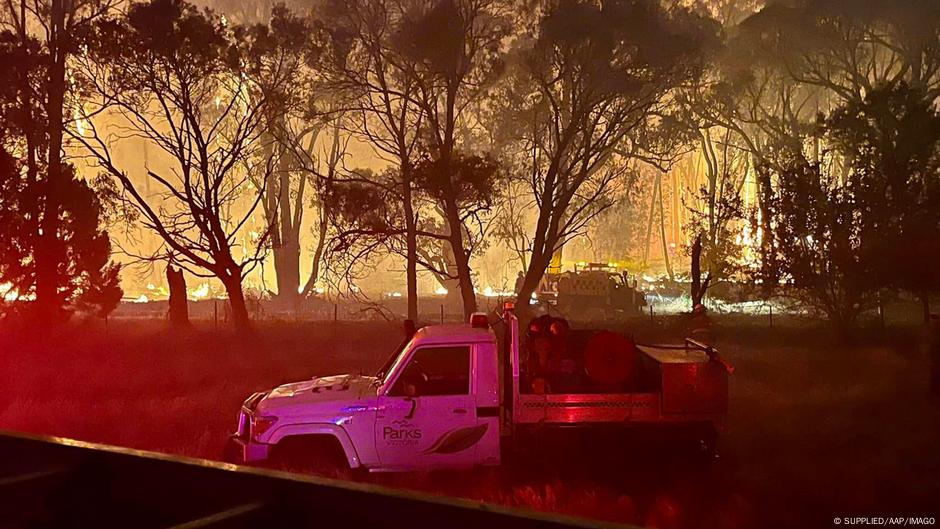 Firefighters were trying to tame bushfires in Victoria, Australia with authorities urging residents in the affected region to flee.