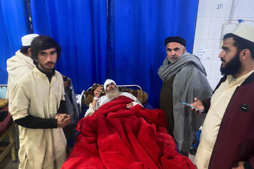 A pair of suicide bombers drove two explosive-filled vehicles into a security installation on Tuesday, killing at least 12 civilians.