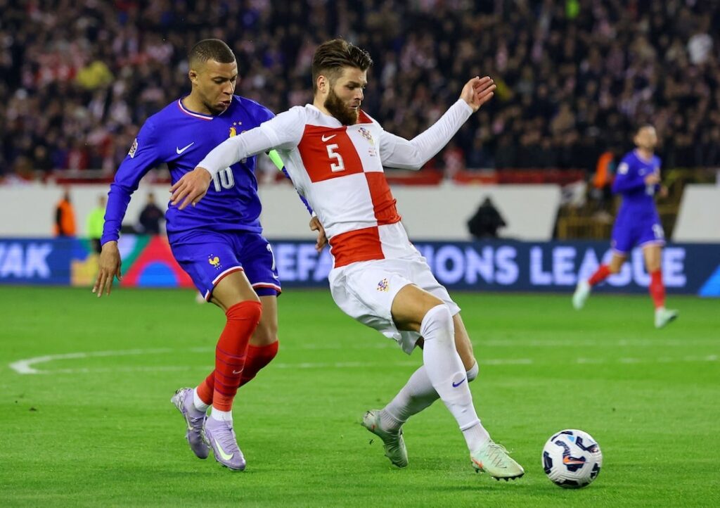 Croatia's Ante Budimir and Ivan Perisic struck to secure a deserved 2-0 win over France in their Nations League quarter-final.