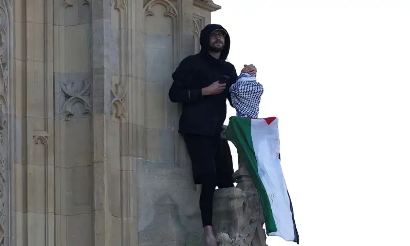 Man climbs London's Big Ben tower waving Palestinian flag
