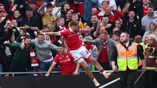 Wrexham earned promotion for a record third straight season with a 3-0 home win over Charlton Athletic in League One on Saturday.