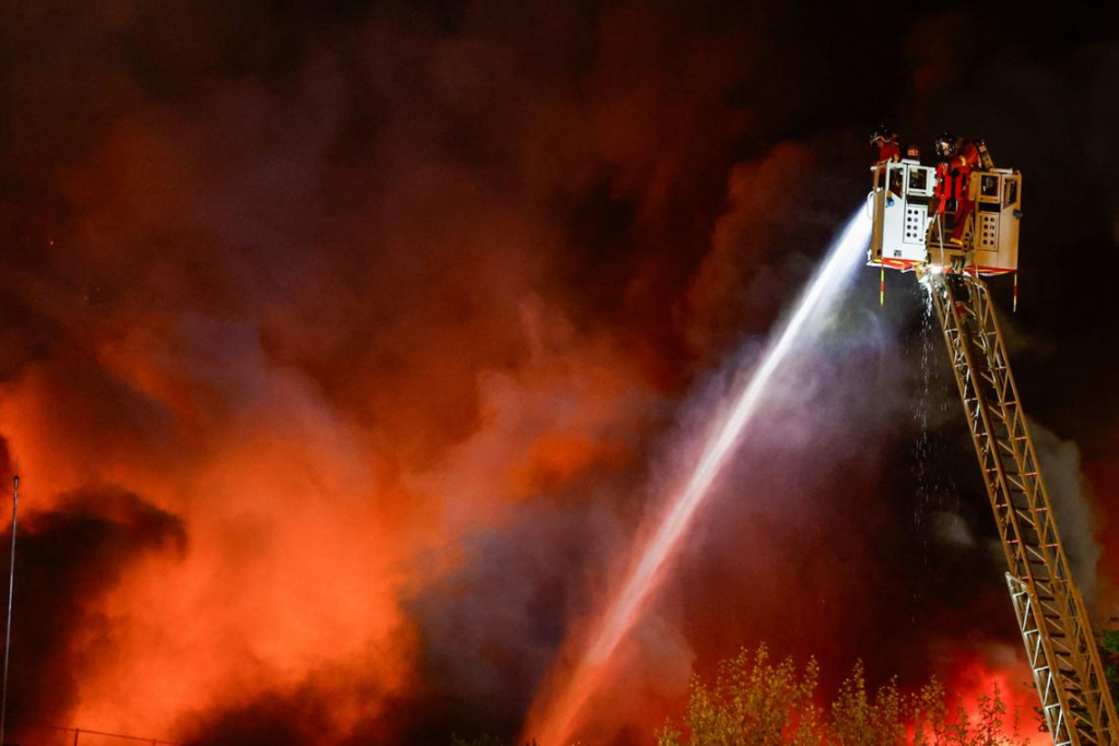 A major fire broke out in Paris, sending smoke across the city and prompting authorities to urge the public to stay away from the zone.