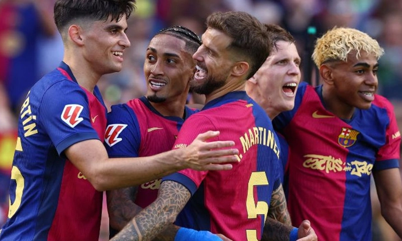 Barca edge Real Madrid