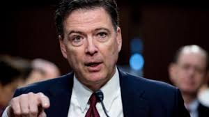 US law enforcement officials said on Thursday they were looking into a social media post by former FBI Director James Comey depicting an image of 