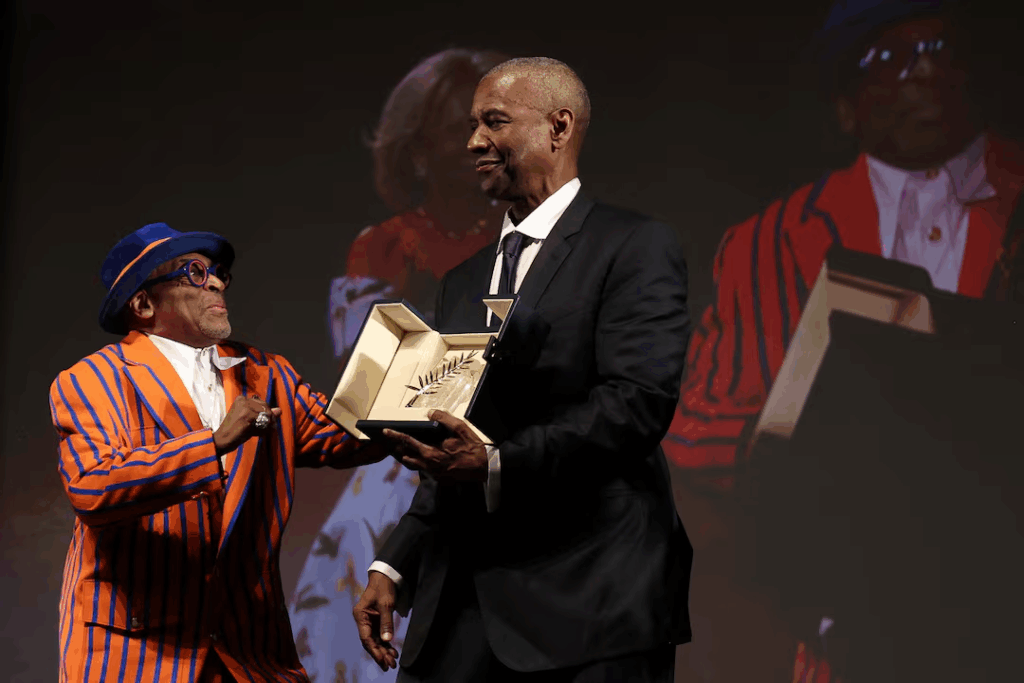 Denzel Washington received a surprise honourary Palme d'Or award at the Cannes in recognition of his outstanding career.