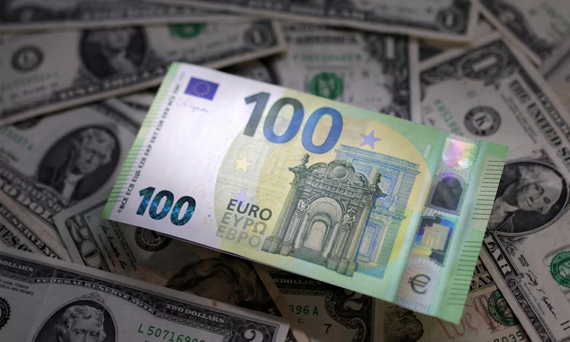 US dollar sinks as inflation cools, euro surges