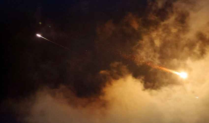 Qatar intercepted an Iranian missile attack on the major US military base on its soil and said it could respond in kind.