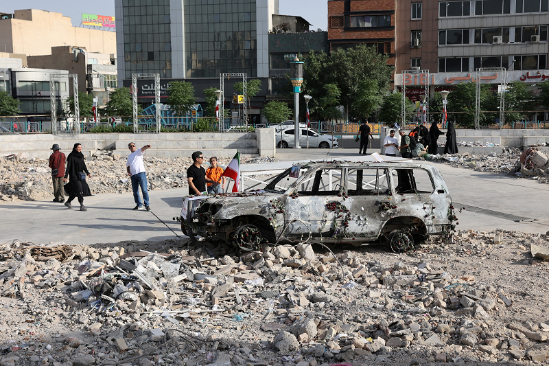 Israel continued its military operations against Iran, even after Trump announced a ceasefire agreement between the two nations. An ambulance burned by Israeli attacks stands on a street, amid the Iran-Israel conflict, in Tehran, Iran, June 23, 2025. Majid Asgaripour/WANA (West Asia News Agency) via REUTERS ATTENTION EDITORS -
