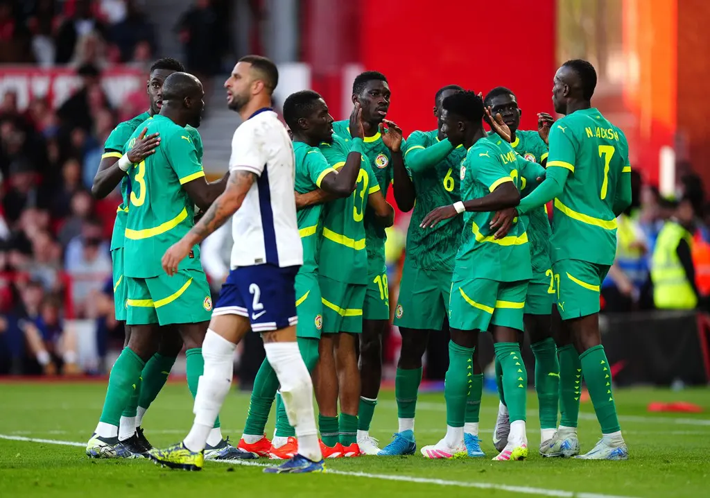 Senegal became the first African team to beat England in 22 games, winning 3-1 in a friendly at the City Ground.