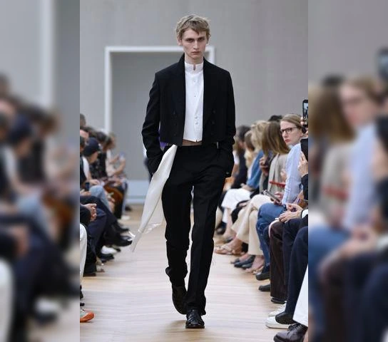 Hermes' menswear artistic director Veronique Nichanian showed a summer 2026 collection featuring airy tops crafted from woven leather.