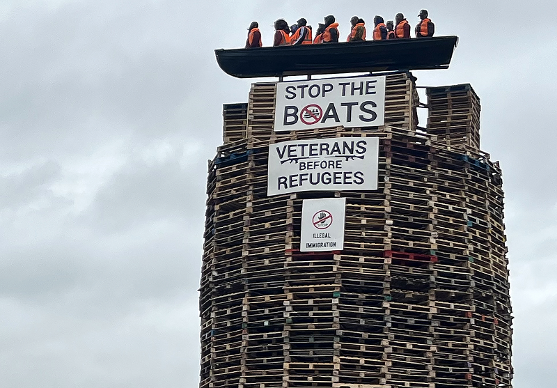 Effigy of migrants placed on bonfire in N.Ireland causes outcry