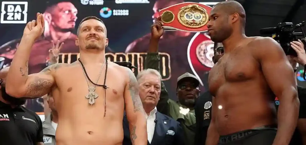 Oleksandr Usyk tried to unsettle Daniel Dubois during their weigh-in at Wembley ahead of their heavyweight title fight.