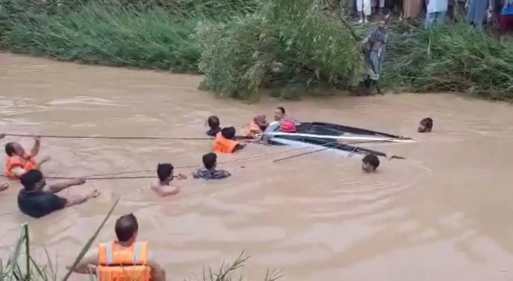 car swept away in Attock