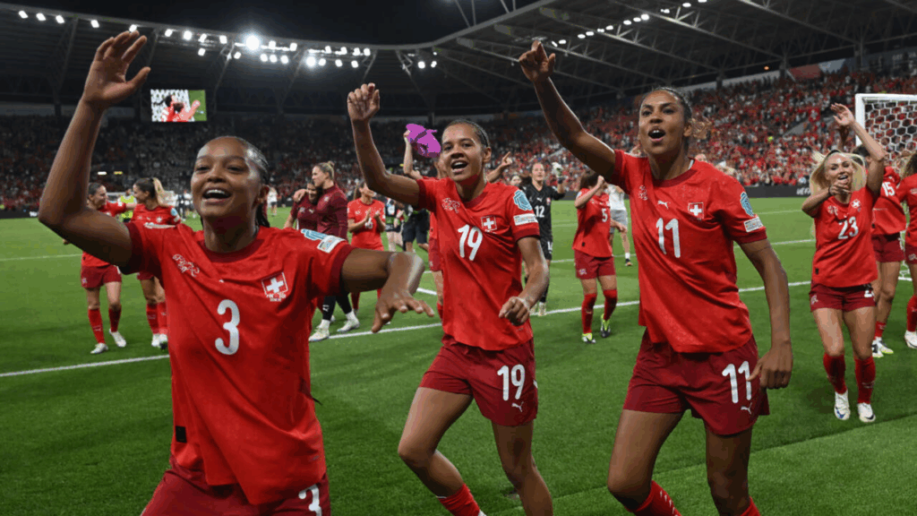 Switzerland's Riola Xhemaili scored a last-gasp goal to salvage a dramatic 1-1 draw with Finland on Thursday that sent the joyous hosts through to the quarter-finals at Euro 2025,