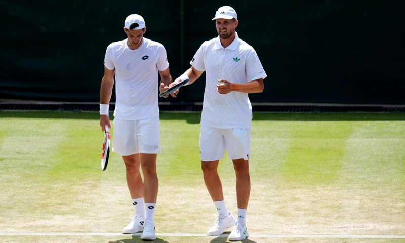 Julian Cash and Glasspool win