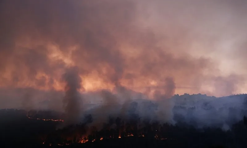 Spain faces extreme heat, battles 20 major wildfires
