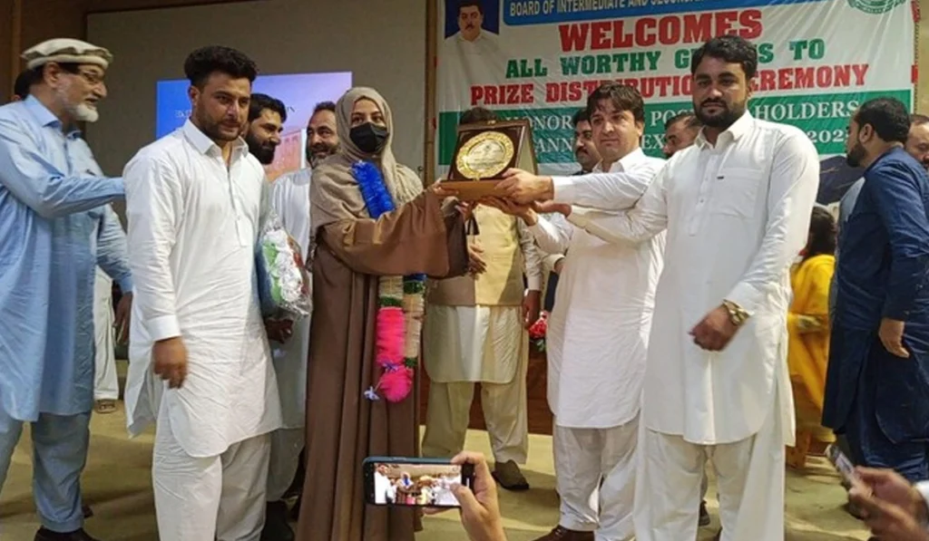 Afghan student tops exams