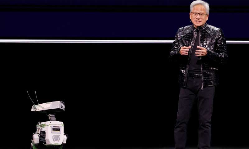 Nvidia CEO Jensen Huang with a robot
