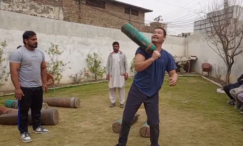 Chinese weightlifter succumbs to Pakistan’s tradition