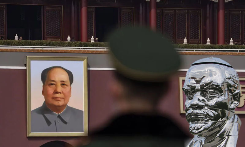 China trials dissident artist over satirical Mao sculptures