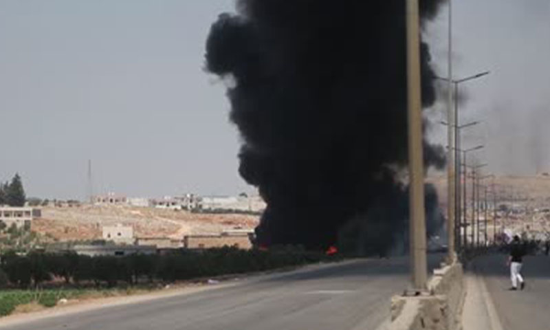 At least 14 killed in explosion at weapons depot in Syria's Idlib, state TV says