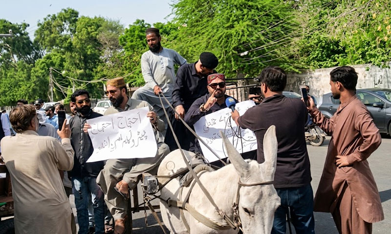 ‘Petrol too expensive’: PTI lawmakers ride donkey carts to Sindh Assembly