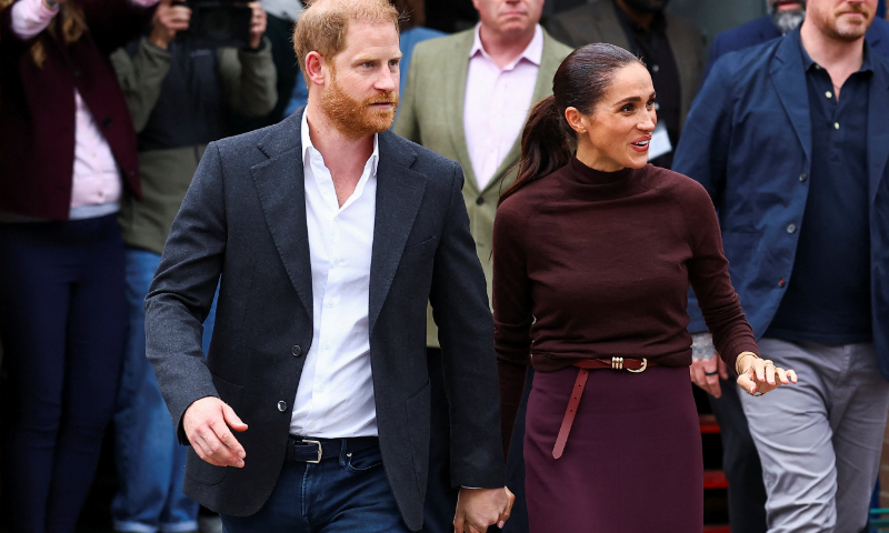Prince Harry and his wife Meghan UK return